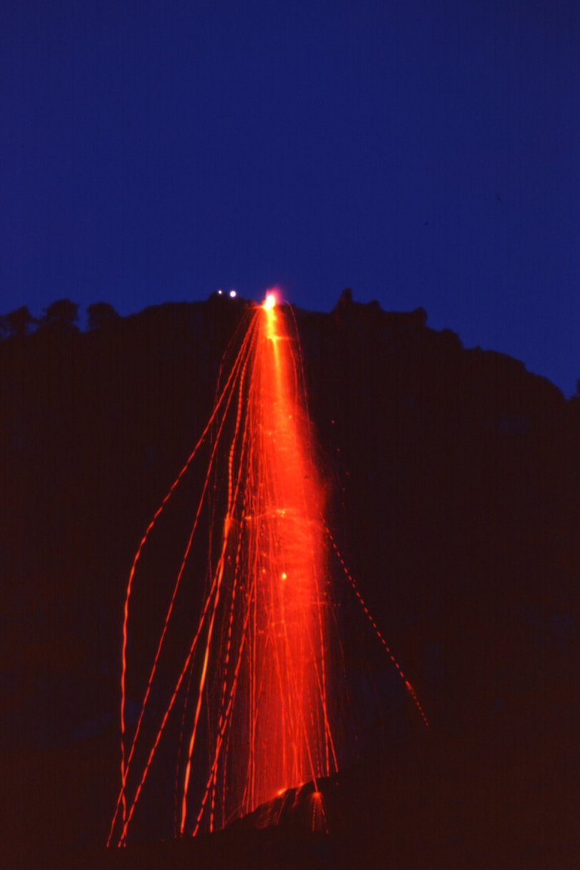 Photo of Yosemite National Park's fire fall, circa 1956.  Taken from Camp Curry with Nikon S with 135mm lens and Kodachrome film. View full size.
